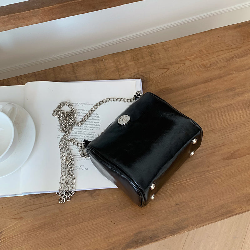 elegant compact shoulder bag