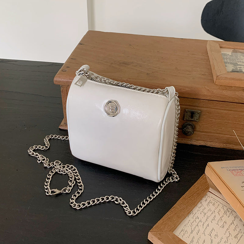 elegant compact shoulder bag