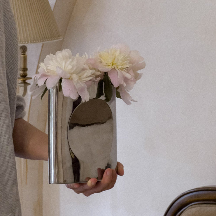 silver metal vase