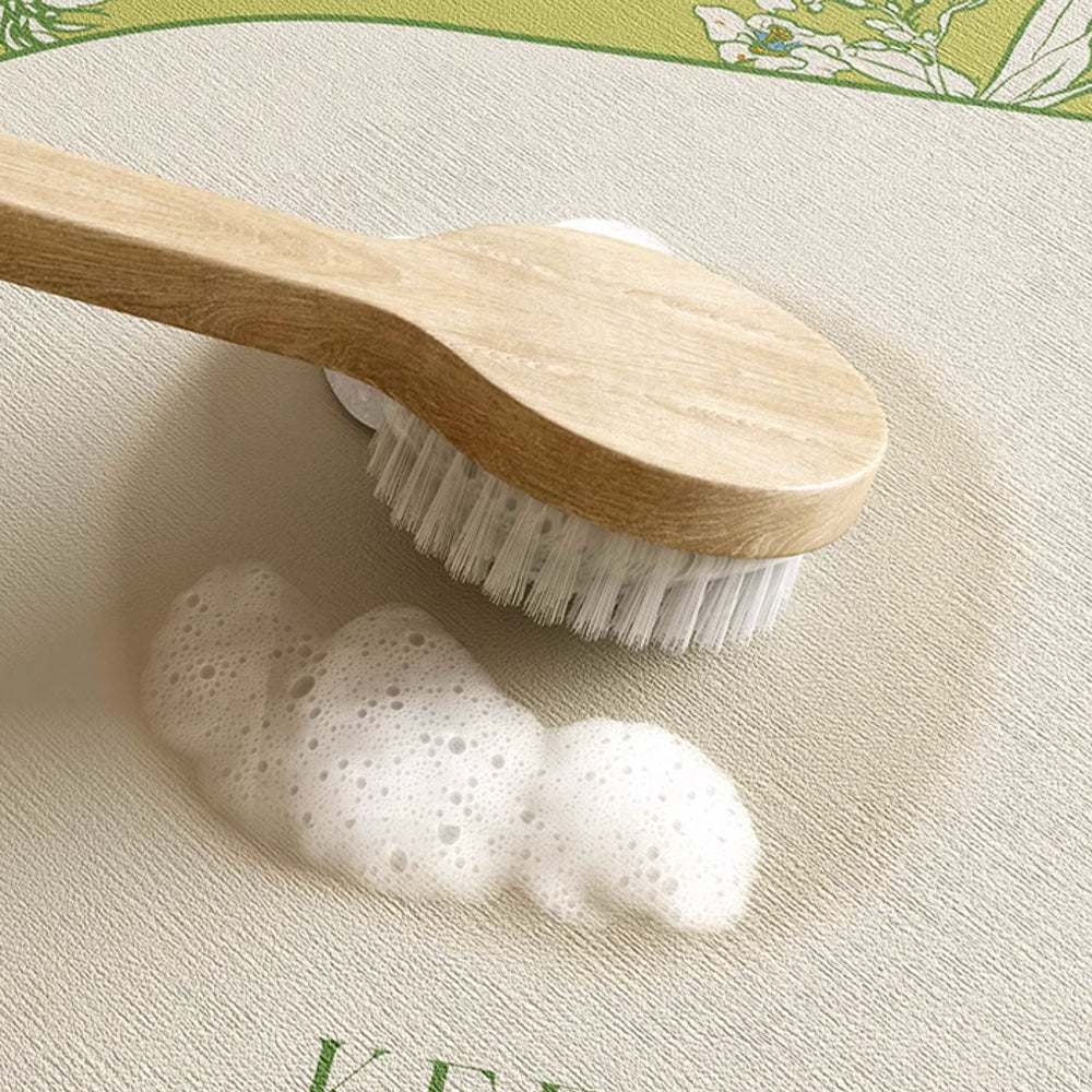 green botanical logo bath mat