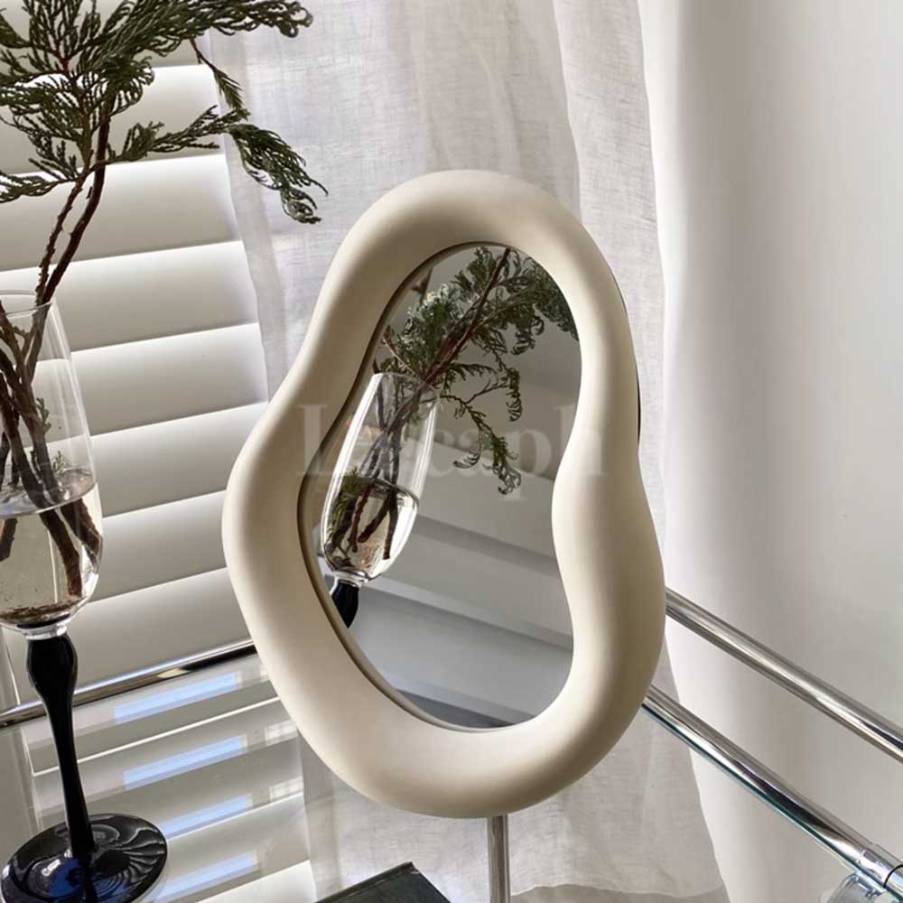 milky white ear mirror