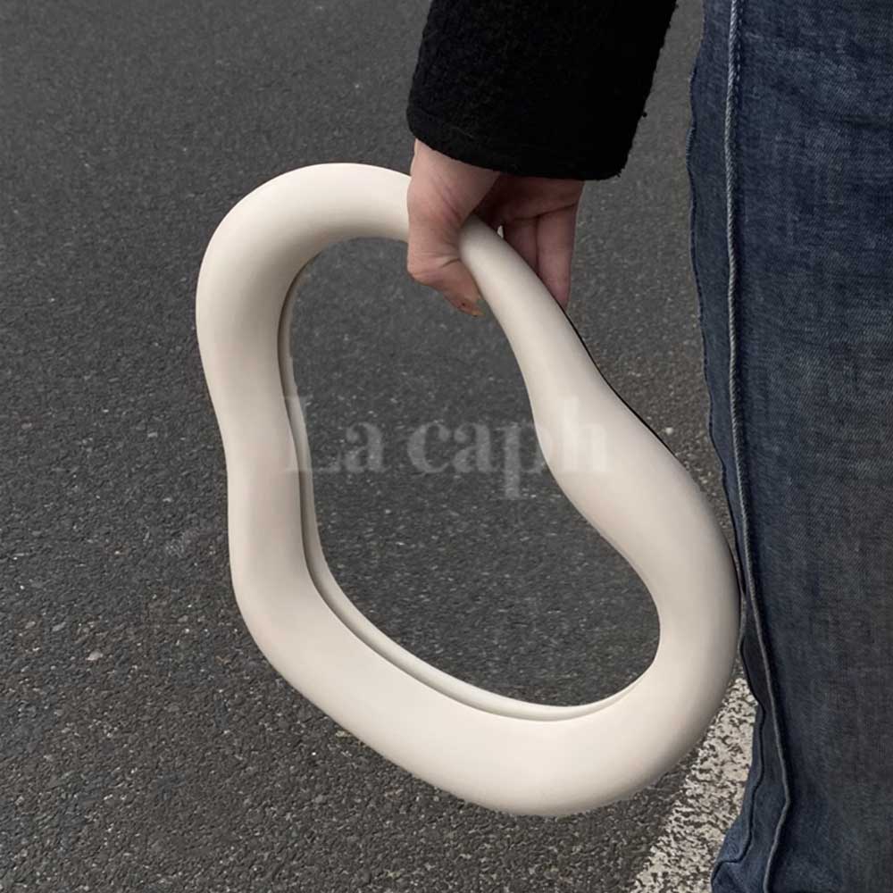 milky white ear mirror