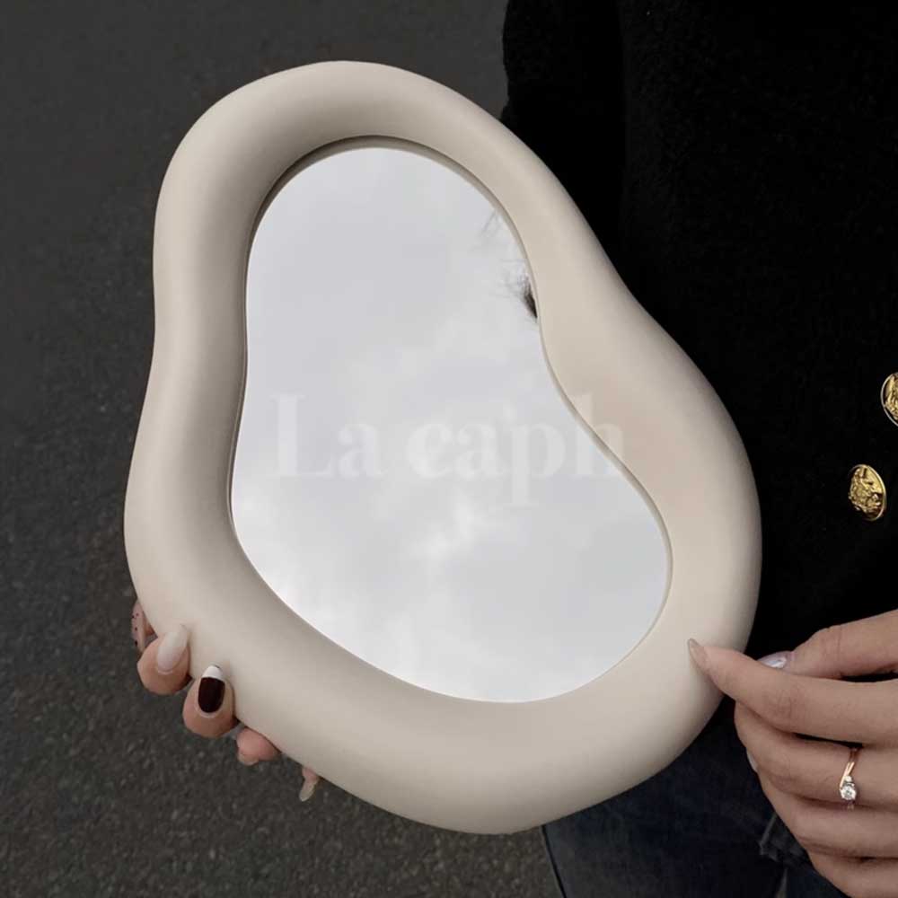 milky white ear mirror