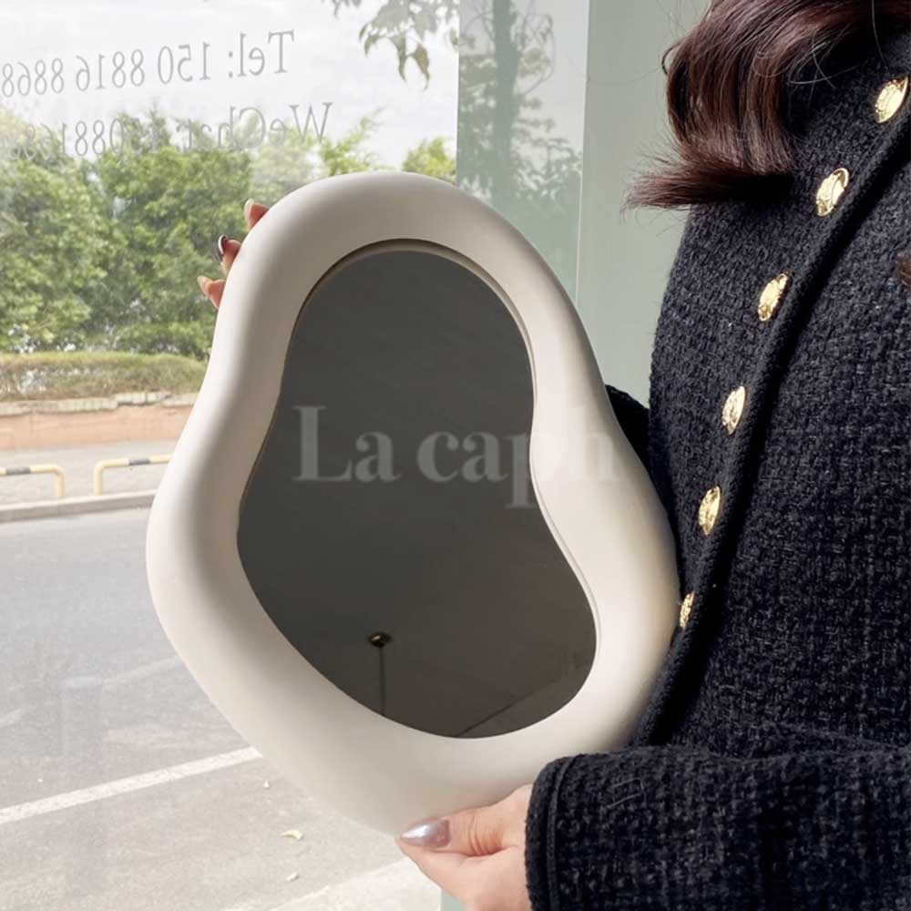 milky white ear mirror