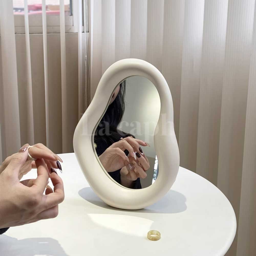 milky white ear mirror