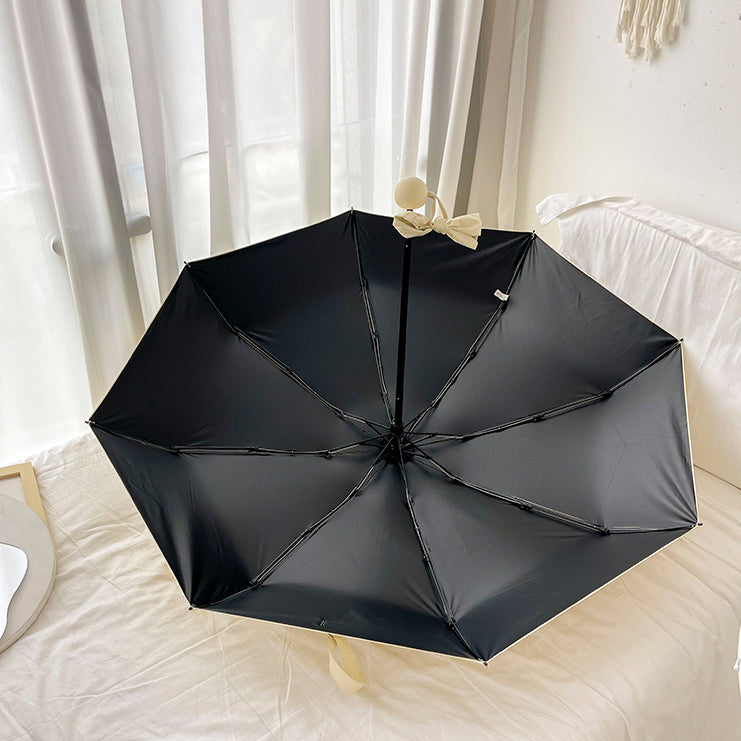 cream color folding uv parasol