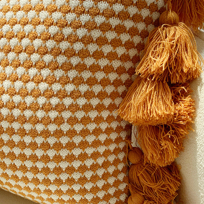orange motif ponpon cushion