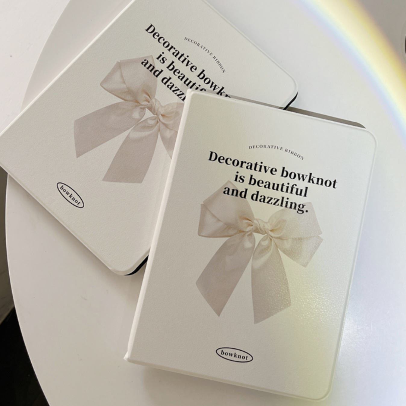 white ribbon iPad case