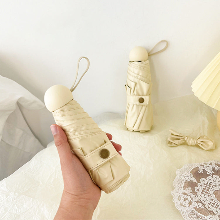 cream color folding uv parasol