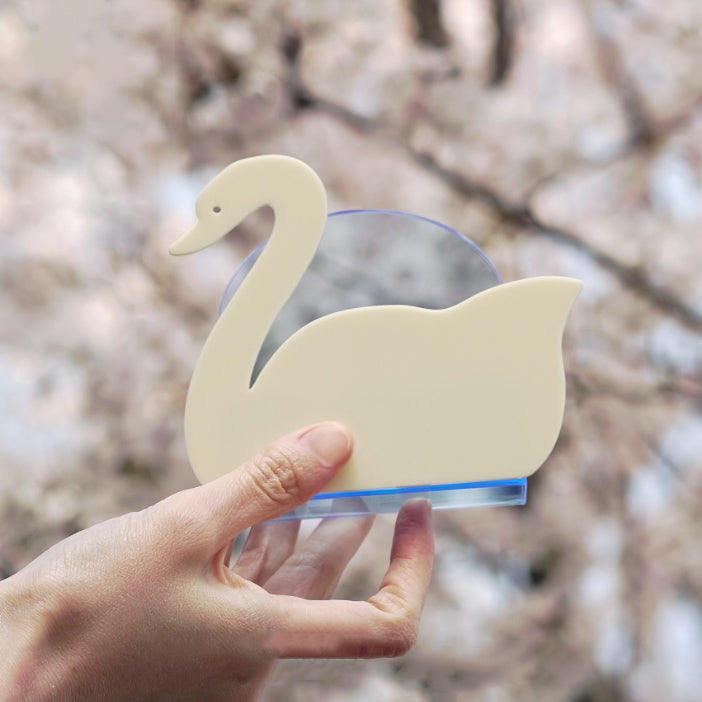 cream swan book stand