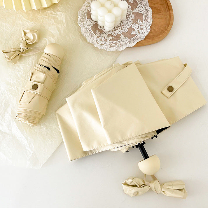 cream color folding uv parasol