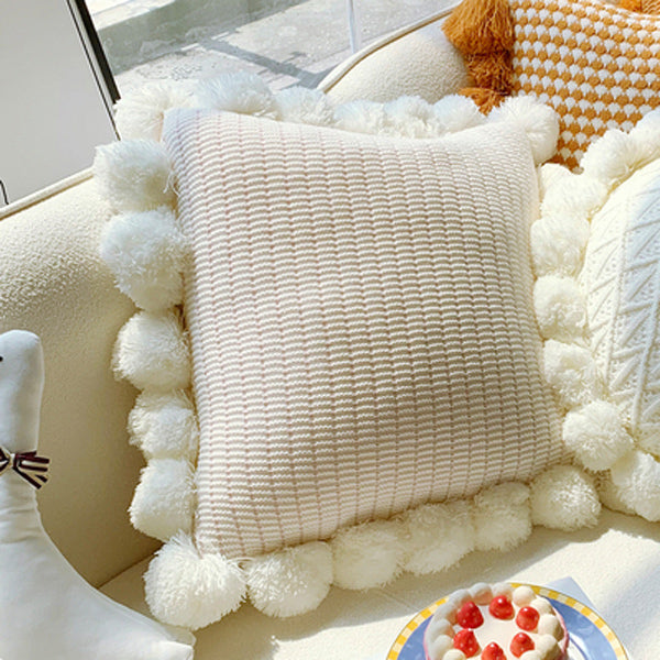 orange motif ponpon cushion
