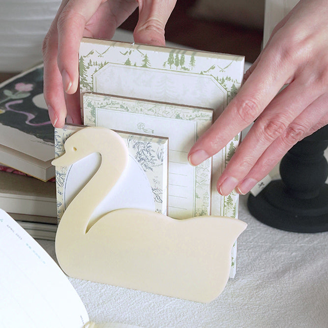 cream swan book stand