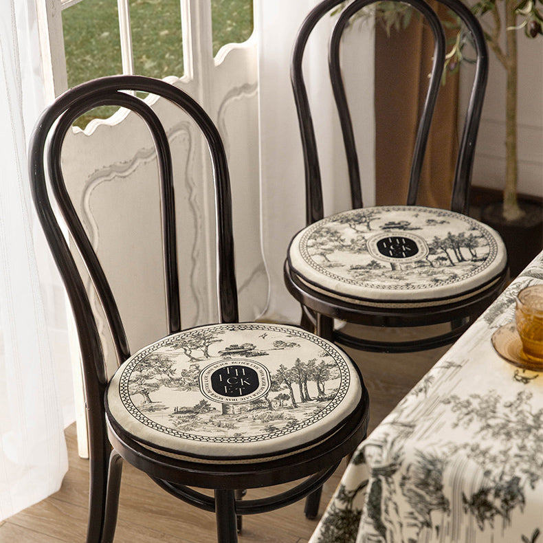 black toile de Jouy round cushion