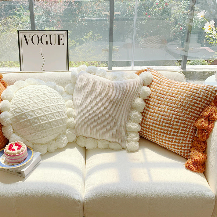 orange motif ponpon cushion