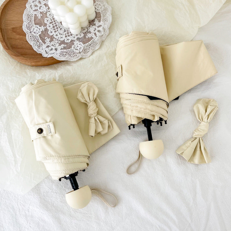 cream color folding uv parasol