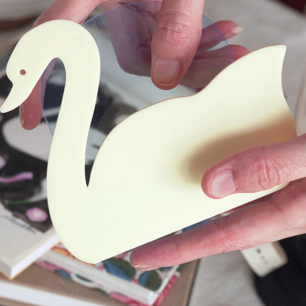 cream swan book stand