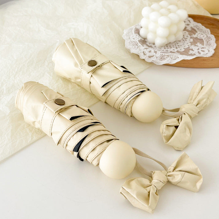 cream color folding uv parasol