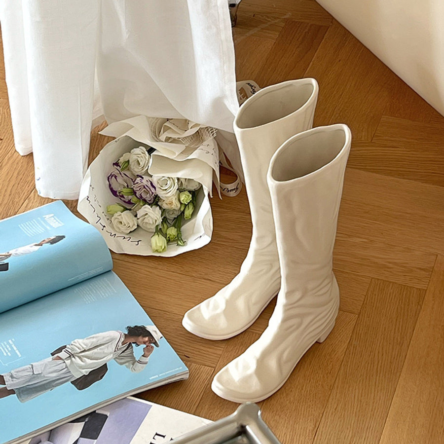 white boots vase