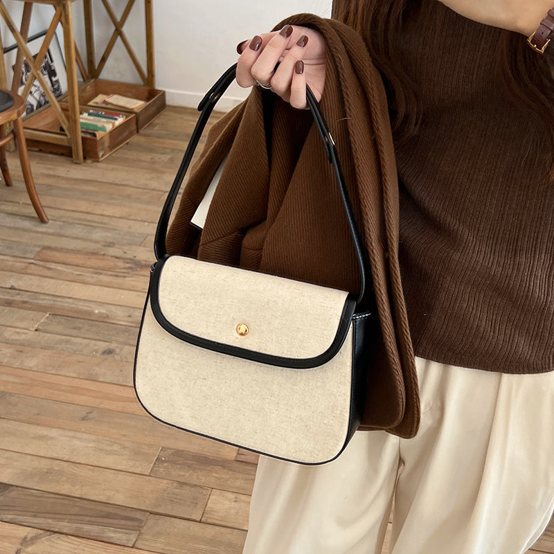 black piping handbag