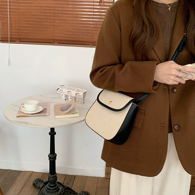 black piping handbag