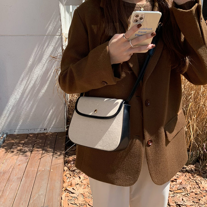 black piping handbag