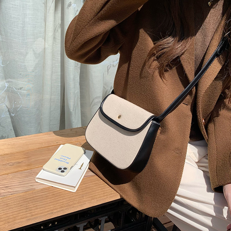 black piping handbag