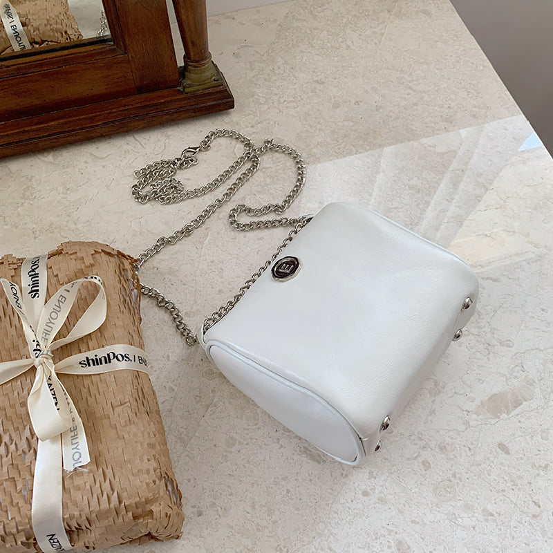 elegant compact shoulder bag