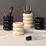 natural monotone make brush stand
