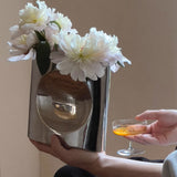 silver metal vase