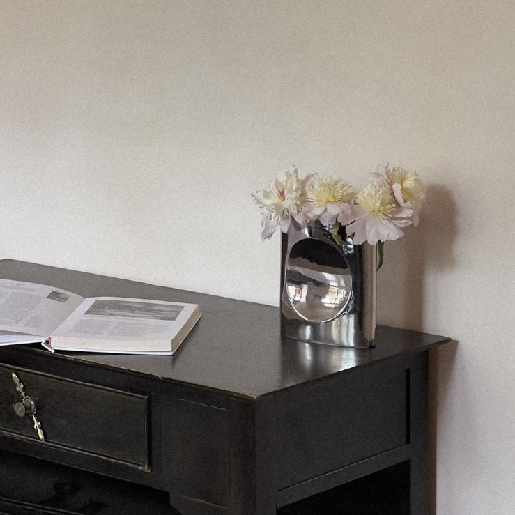 silver metal vase