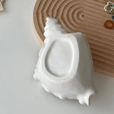 white shell accessory tray