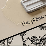 art philosopher logo kitchen mat