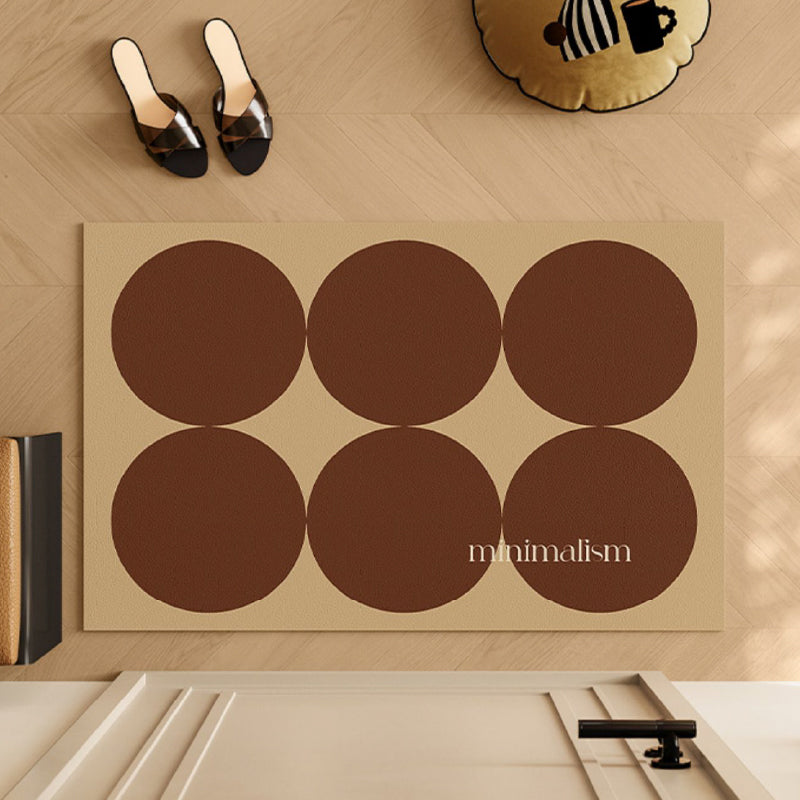 brown circle minimalism door mat