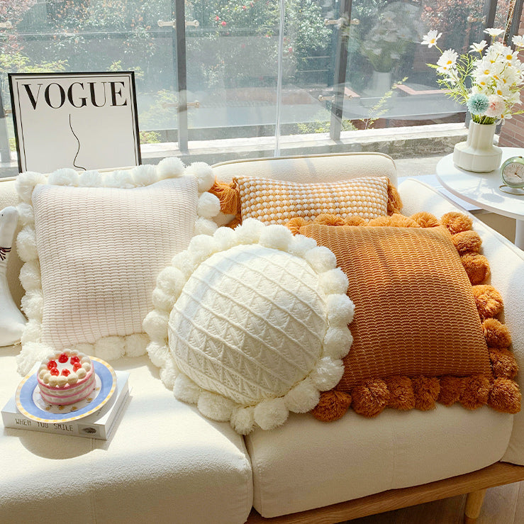 orange motif ponpon cushion