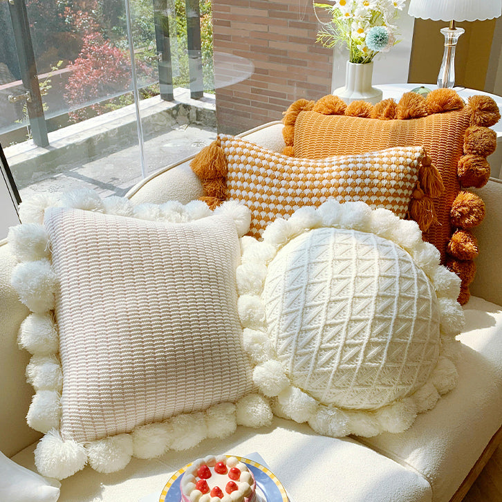 orange motif ponpon cushion