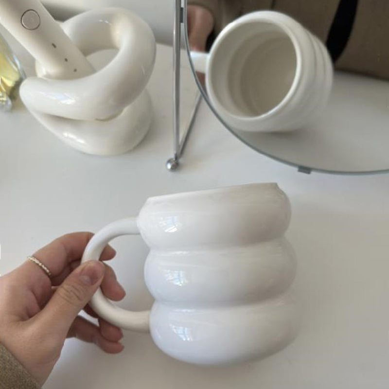 white ceramic baum mug