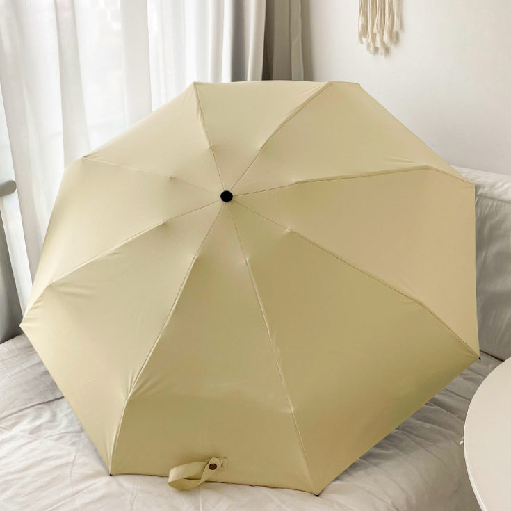 cream color folding uv parasol