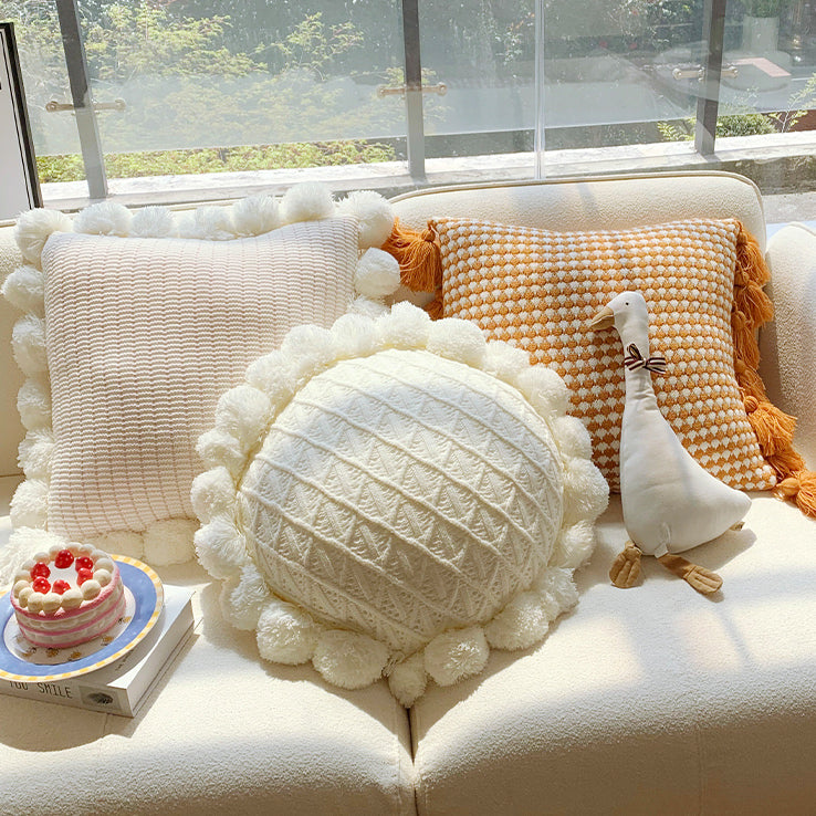 orange motif ponpon cushion