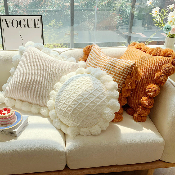 orange motif ponpon cushion