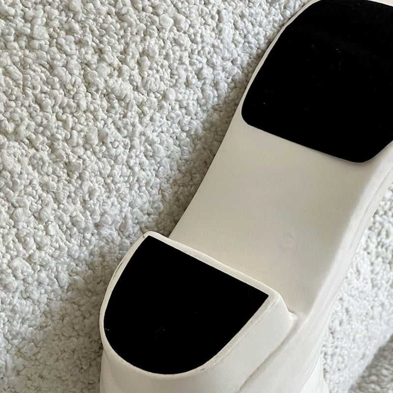 white boots vase