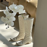 white boots vase